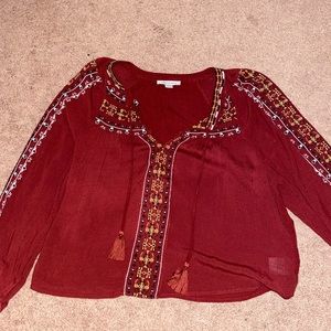 red embroidered AE top